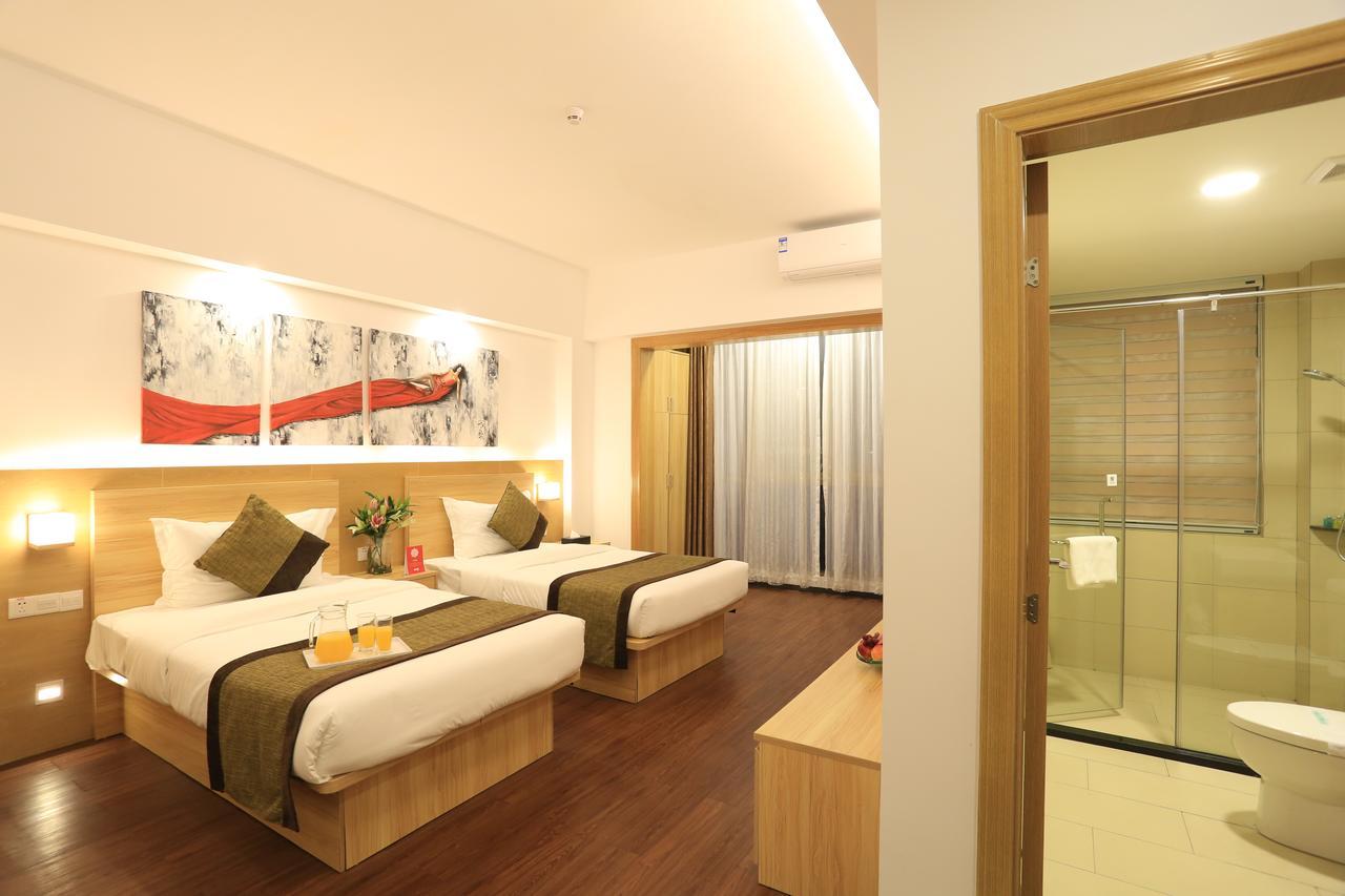 Oyo8001 Tiandi Hotel Shenzhen Exterior photo